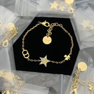 Dior Gold-Tone CD Logo Star and Clover Charm Bracelet