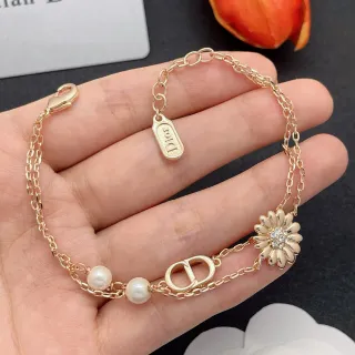 Dior Gold-Tone Double Chain Pearl and Daisy Charm Bracelet