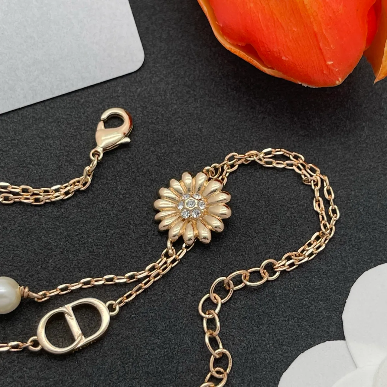 Dior Gold-Tone Double Chain Pearl and Daisy Charm Bracelet 4