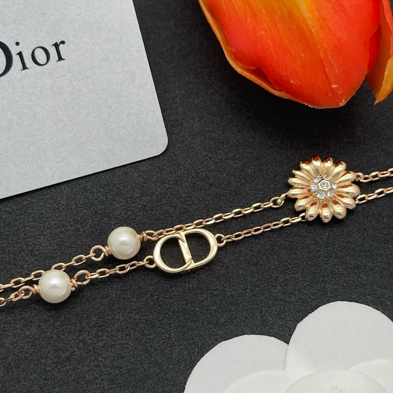Dior Gold-Tone Double Chain Pearl and Daisy Charm Bracelet 6