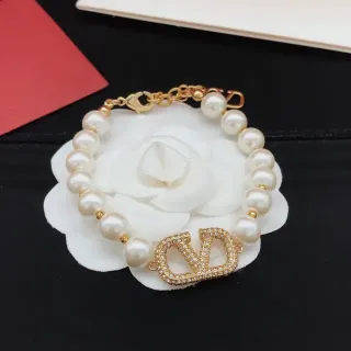 Dior bracelet or blanc perles chaîne hardware