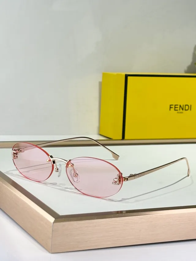 Fendi Óculos de sol com lente oval dourada marrom e armação metálica fina 2