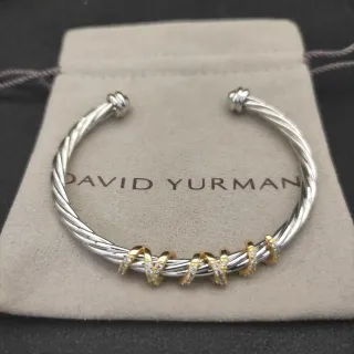 David Yurman Cable Classics سوار معدني ملتوي ثنائي اللون فضي ذهبي