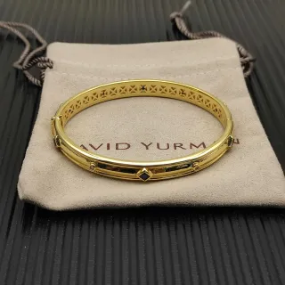 David Yurman pulseira tubular azul dourado estrutura geométrica interior
