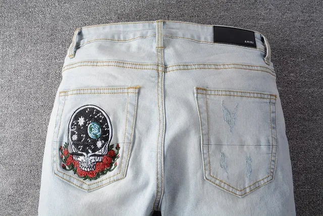 Distressed Light-Wash Patchwork Embroidered Bear Motif Jeans 2