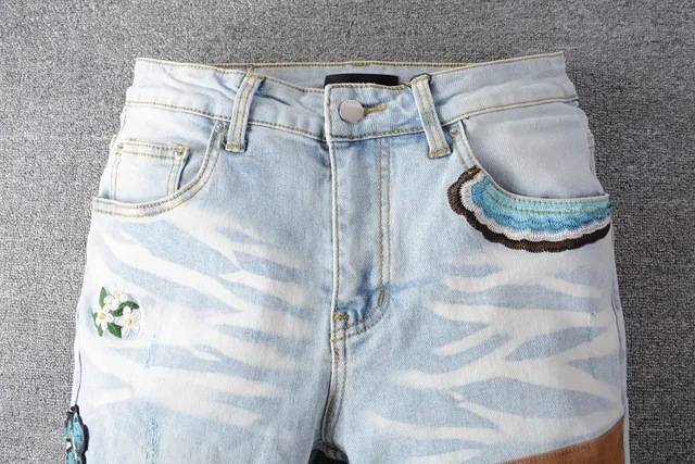 Distressed Light-Wash Patchwork Embroidered Bear Motif Jeans 11