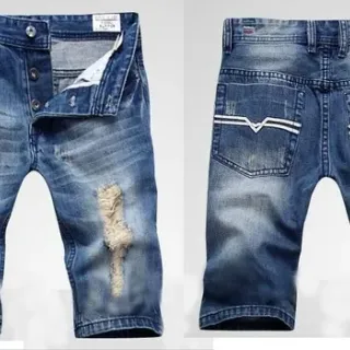 Distressed Mid-Rise Button-Fly Cuffed Denim Shorts