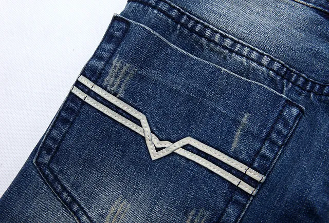 Distressed Mid-Rise Button-Fly Cuffed Denim Shorts 3