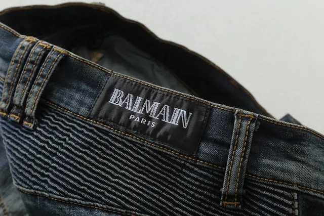 Distressed Moto-Panelled Zippered Tapered Jeans 3
