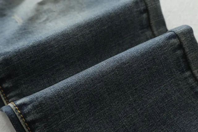 Distressed Moto-Panelled Zippered Tapered Jeans 7