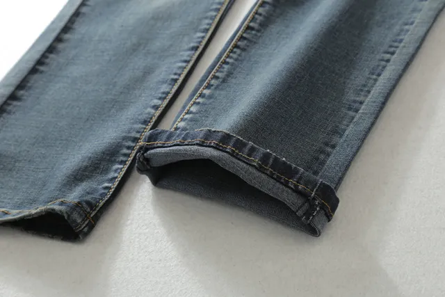 Distressed Moto-Panelled Zippered Tapered Jeans 8