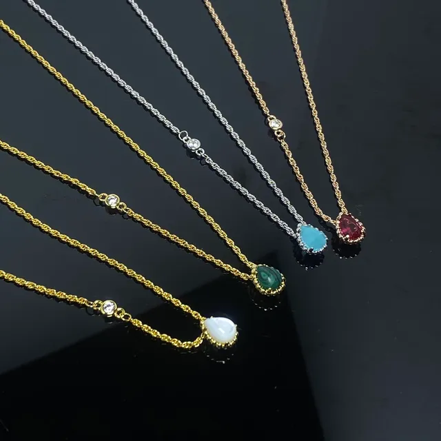 Gold and Silver Tone Single-Stone Teardrop Pendant Necklaces 2