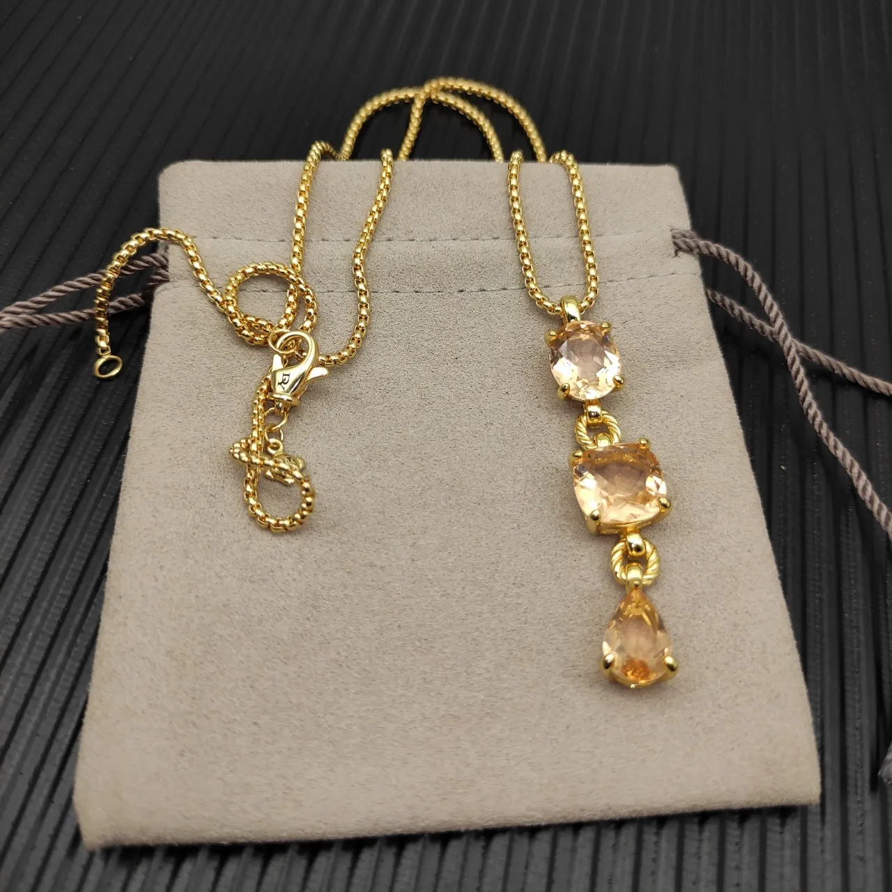 Gold Orange Three-Stone Vertical Pendant Twisted Connectors Necklace 4