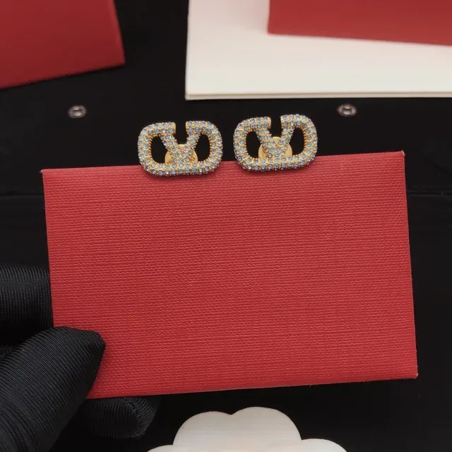 Gold-Tone Pave Light Blue Crystal Interlocking Loop Stud Earrings 7