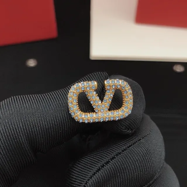 Gold-Tone Pave Light Blue Crystal Interlocking Loop Stud Earrings 8