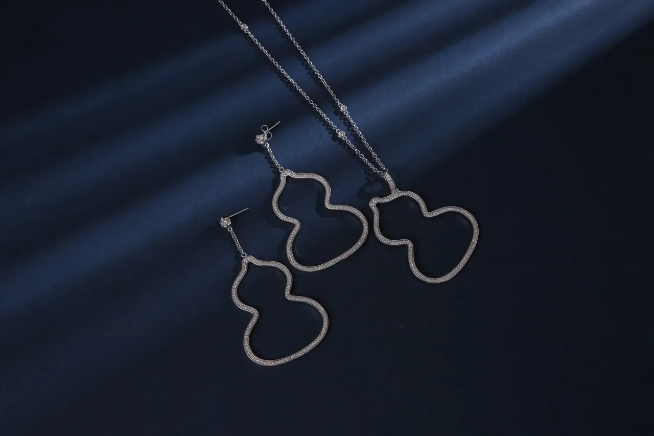 Gold-Tone Pavé Open-Outline Double-Lobe Dangling Earrings 4