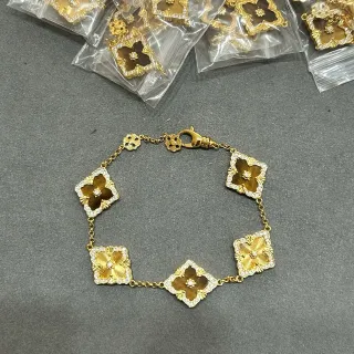 Pulsera de Cristal Pavé con Diseño Floral Cuadrifolio y Ojo de Tigre Acabado en Oro