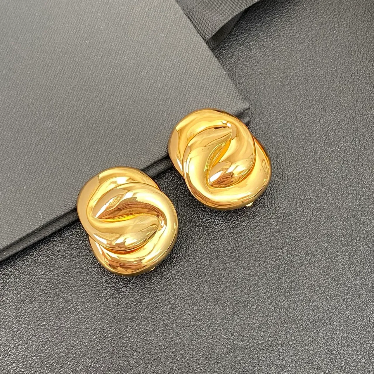 Polished Gold-Tone Twisted Knot Stud Earrings 8