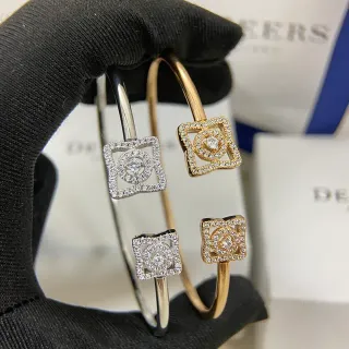 Pulseras de brazalete abierto con motivo cuadrado pavé en tono plateado y dorado