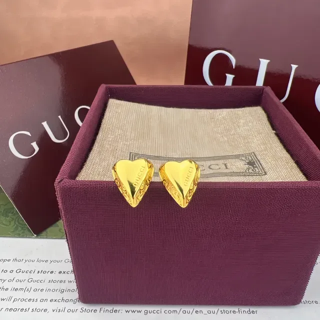 Gucci Ami de Coeur Heart-Shaped Gold and Silver Earrings 7