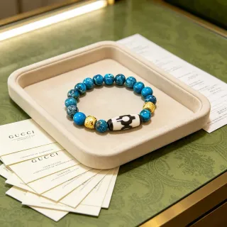 Gucci Pulsera de cuentas azules y doradas con piedras de estilo turquesa