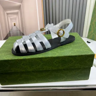 Gucci Dionysus Silver Gold Metallic Leather Straps Black Rubber Sole Gladiator Sandals