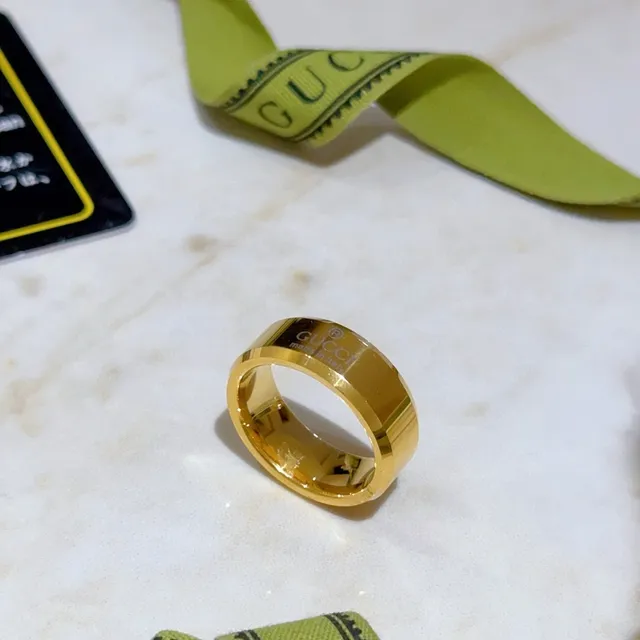 Gucci Engraved Logo Wide Band Gold-Tone Ring 6