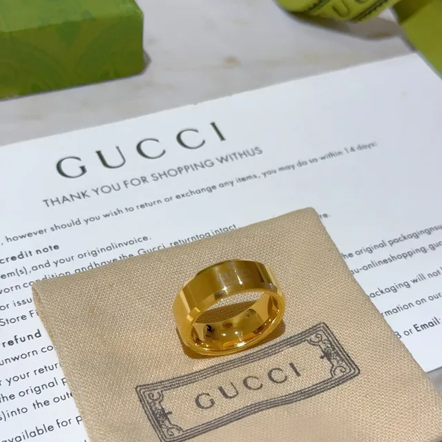 Gucci Engraved Logo Wide Band Gold-Tone Ring 9