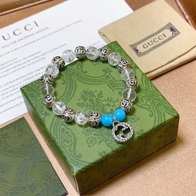 سوار Gucci GG Marmont أزرق شفاف Interlocking G Charms خرز كريستال وتركواز 2