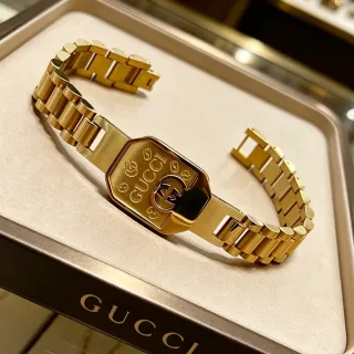 Gucci Gold Octagonal Engraved Plaque Polished Metal Bracelet