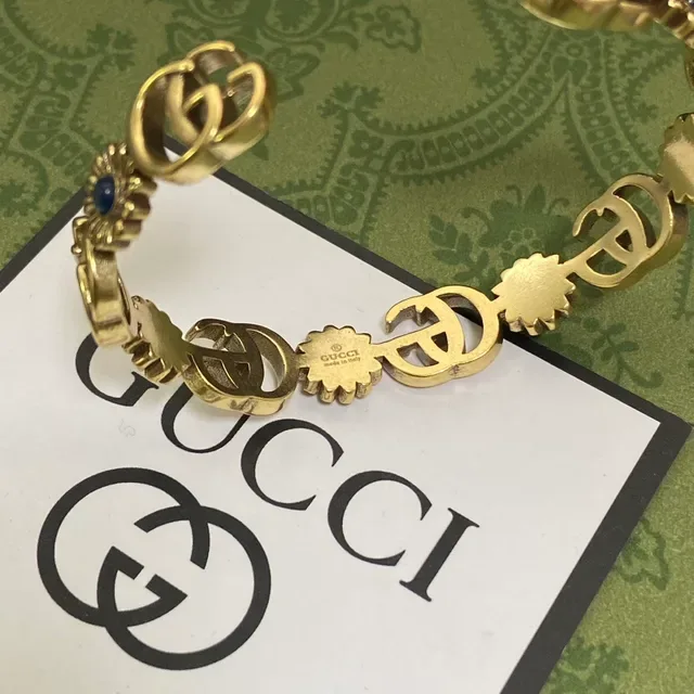 Gucci Interlocking G and Floral Motif Gold-Tone Bracelet 2