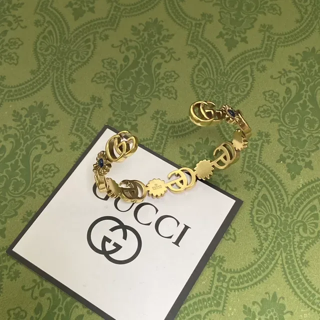 Gucci Interlocking G and Floral Motif Gold-Tone Bracelet 3