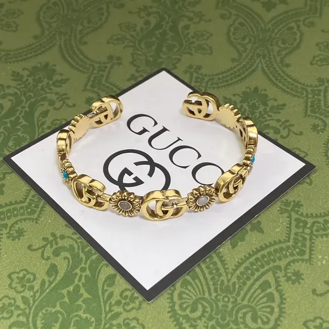 Gucci Interlocking G and Floral Motif Gold-Tone Bracelet 4