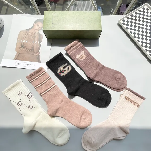 Chaussettes en maille avec logo et motif Gucci 4
