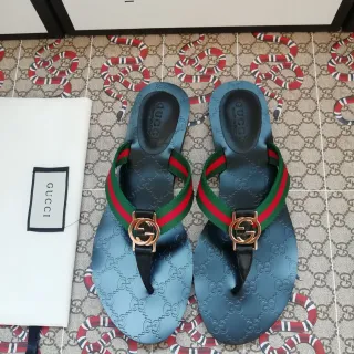 Gucci Ophidia नीला एम्बॉस्ड GG वेब स्ट्रैप स्लिपर्स