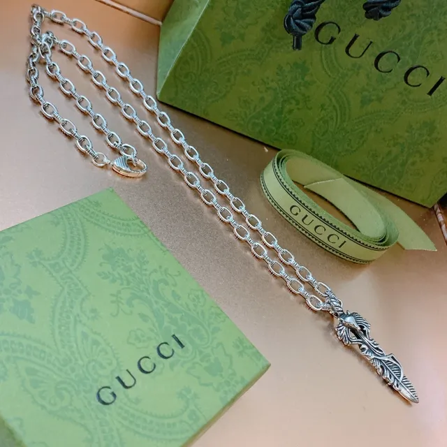 Gucci Ornate Silver Feather Animal Head Pendant Necklace 4