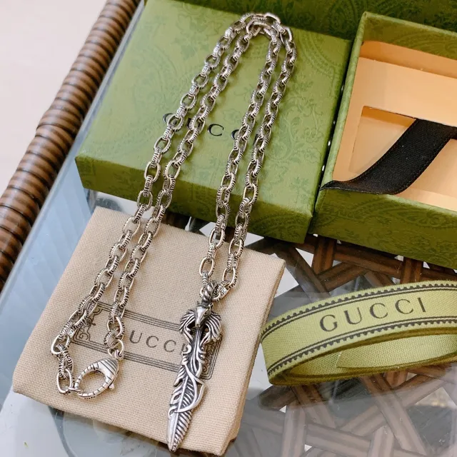 Gucci Ornate Silver Feather Animal Head Pendant Necklace 5