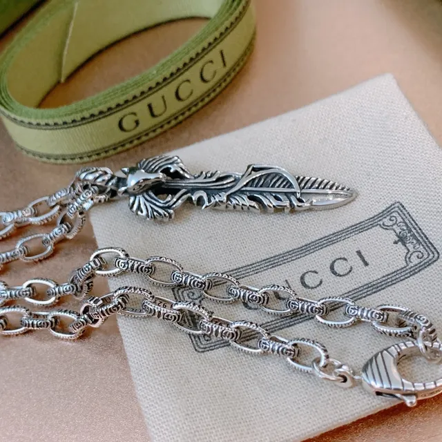 Gucci Ornate Silver Feather Animal Head Pendant Necklace 6