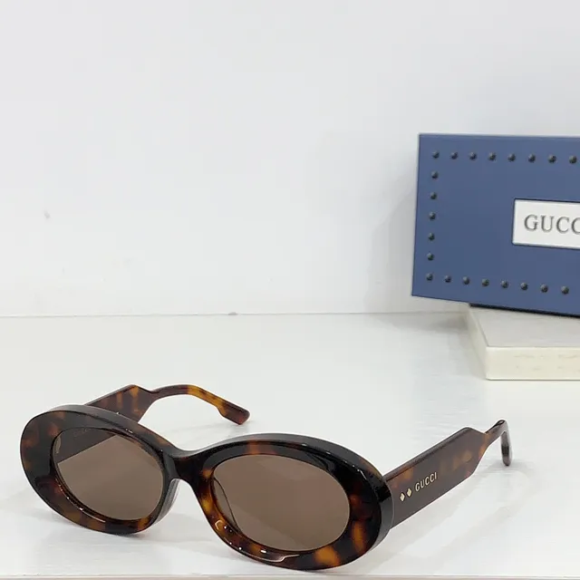 Gucci Screener Lunettes de Soleil Ovale Tortue 9