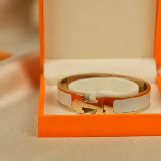 Hermès Clic H White Enamel Gold-Tone Bracelet