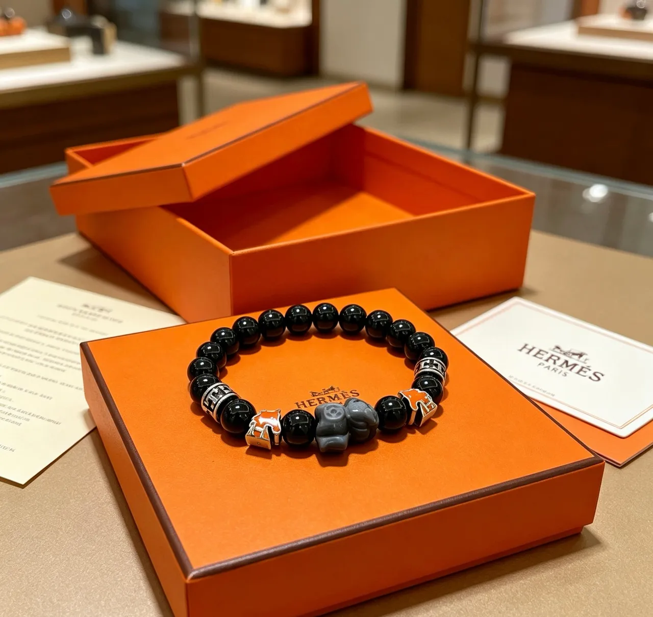 Hermès Éléphant Black Bead and Orange Enamel Elephant Charm Bracelet 5