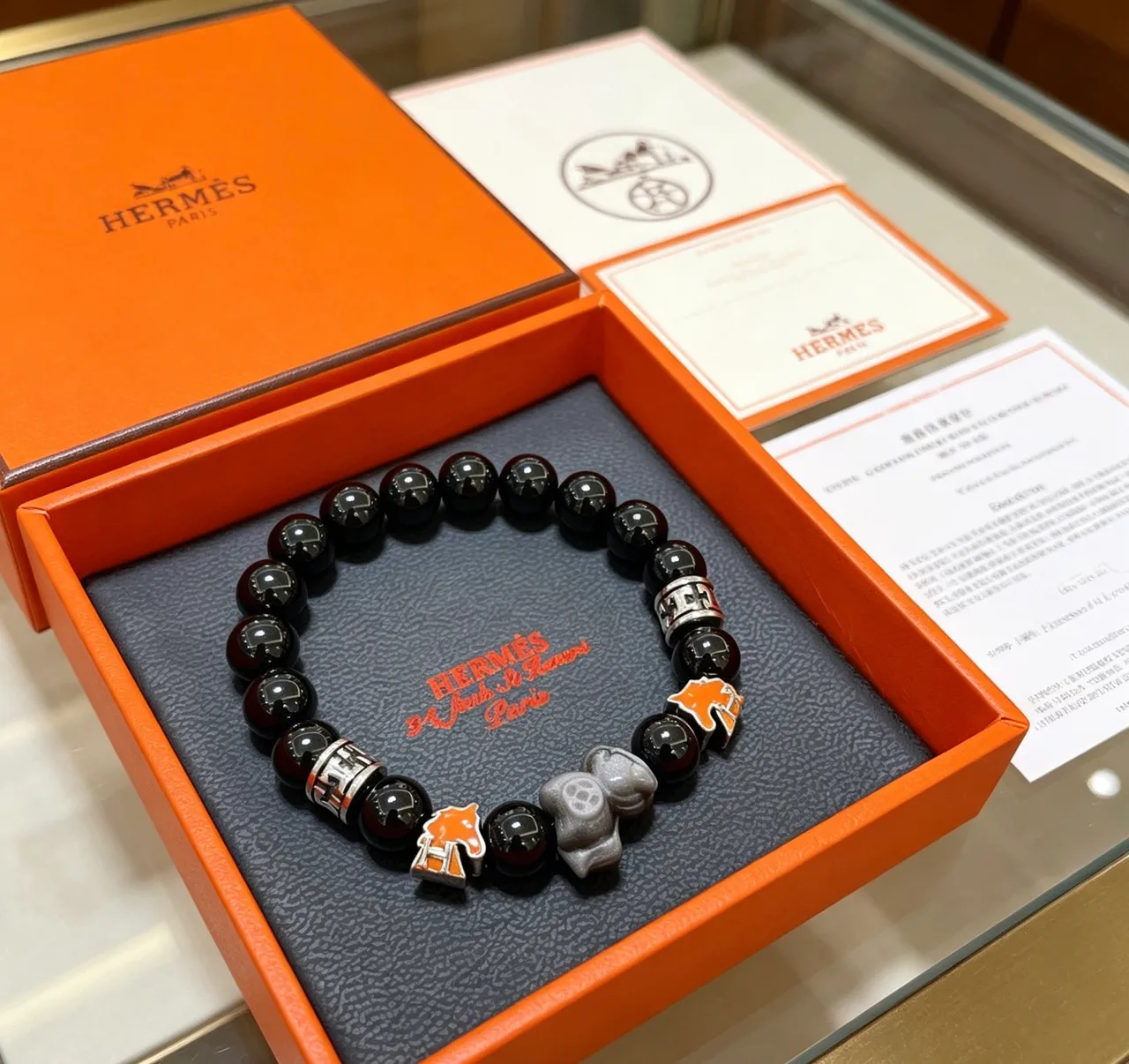 Hermès Éléphant Black Bead and Orange Enamel Elephant Charm Bracelet 8