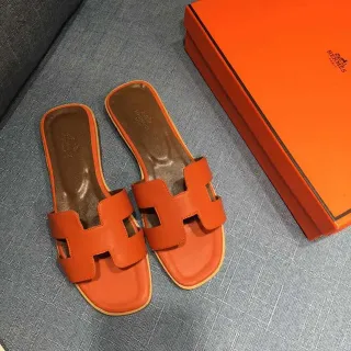 Hermès Oran Orange Leather Slippers