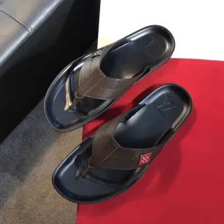 Louis Vuitton chanclas de cuero con tiras de dedo negras y marrones con suela de goma moldeada