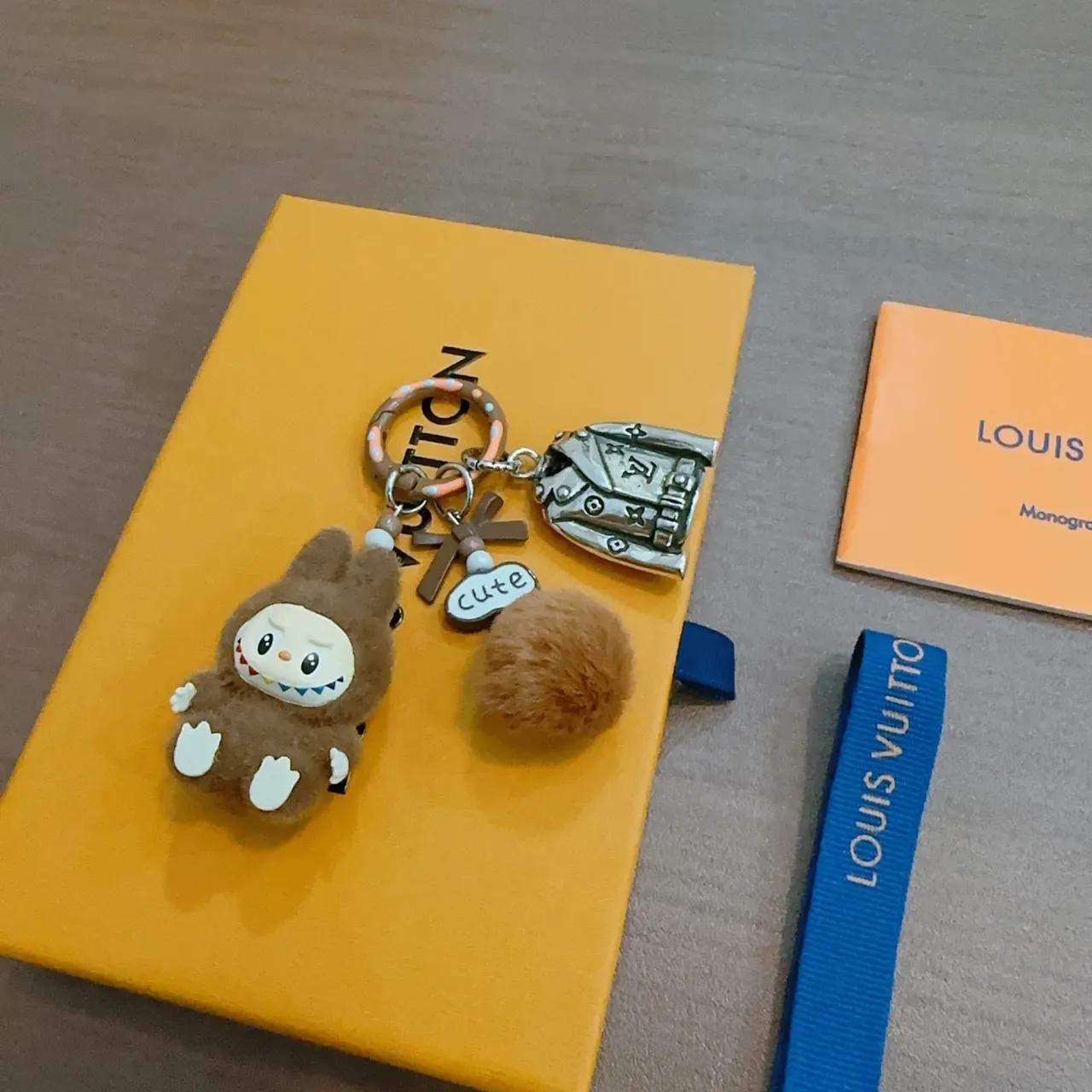 Louis Vuitton Brown Orange Plush Character Metallic LV Jacket Charm Phone Accessory 3