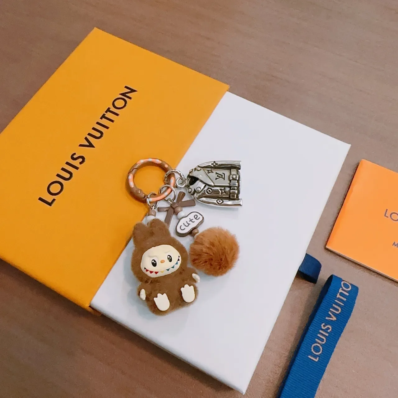 Louis Vuitton Brown Orange Plush Character Metallic LV Jacket Charm Phone Accessory 4