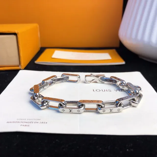 Louis Vuitton Chain Reaction Engraved Monogram Silver Bracelet 9
