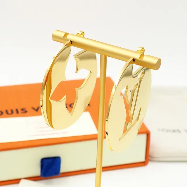 Louis Vuitton Circular Cutout Monogram and Flower Earrings 6