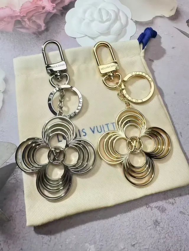 Louis Vuitton Flower Key Holder Gold Metal Quatrefoil Floral Motif Bracelet 6