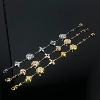 Louis Vuitton Gold Silver Crystal-Paved Four-Petal Flower Motif Bracelet